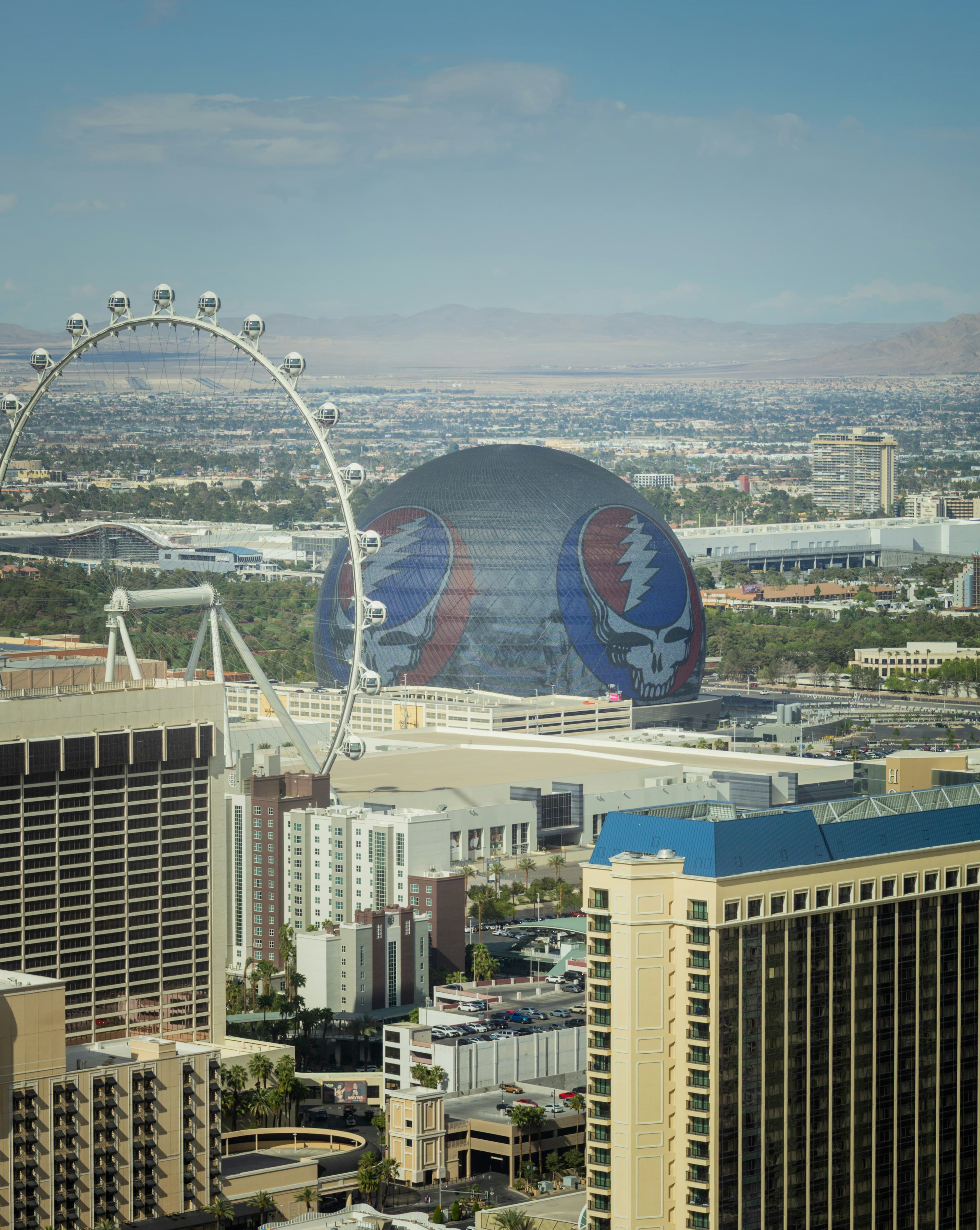 The Las Vegas skyline at dusk with the observation wheel and the Sphere
